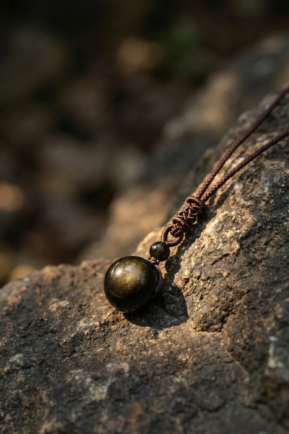 Colgante obsidiana dorada
