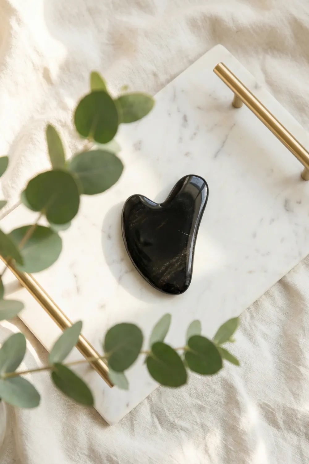 Gua Sha obsidiana facial