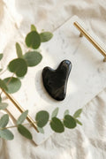Gua Sha obsidiana facial