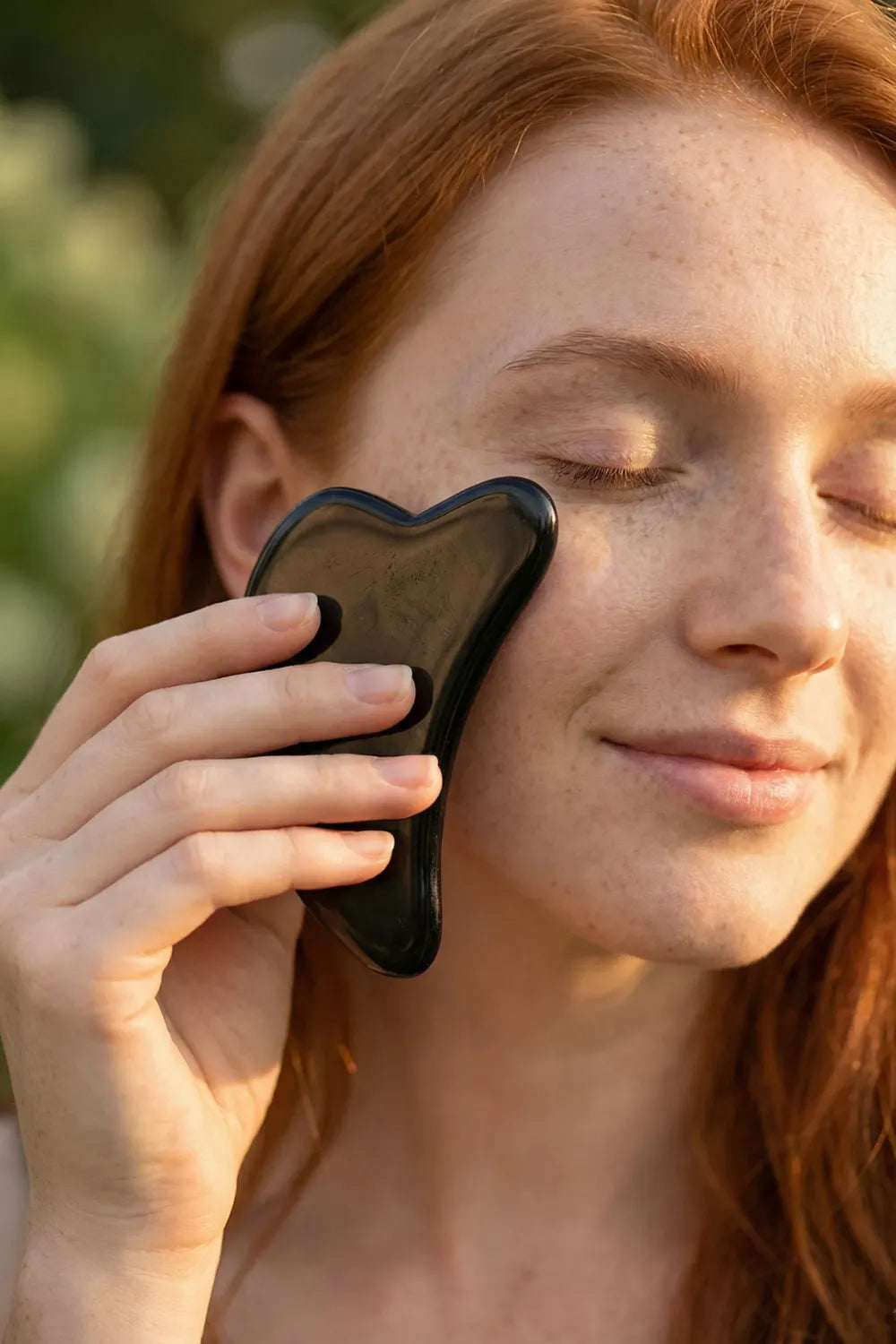 Gua Sha obsidiana facial